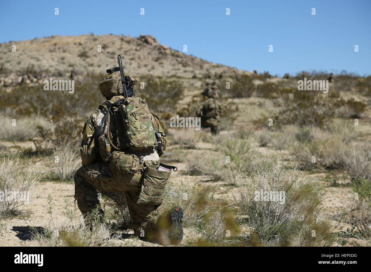 U.S. Army Soldiers, assigned to Delta Company, 3rd Battalion, 75th Ranger Regiment, take cover