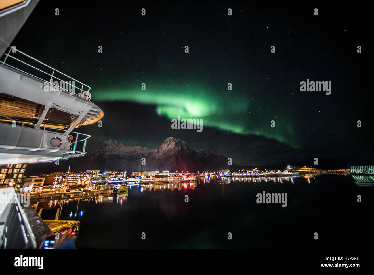 Northern Lights, Aurora,borealis, display over the Hurtigruten coastal steamer sailing through the Lofoten Islands, Norway. Stock Photo