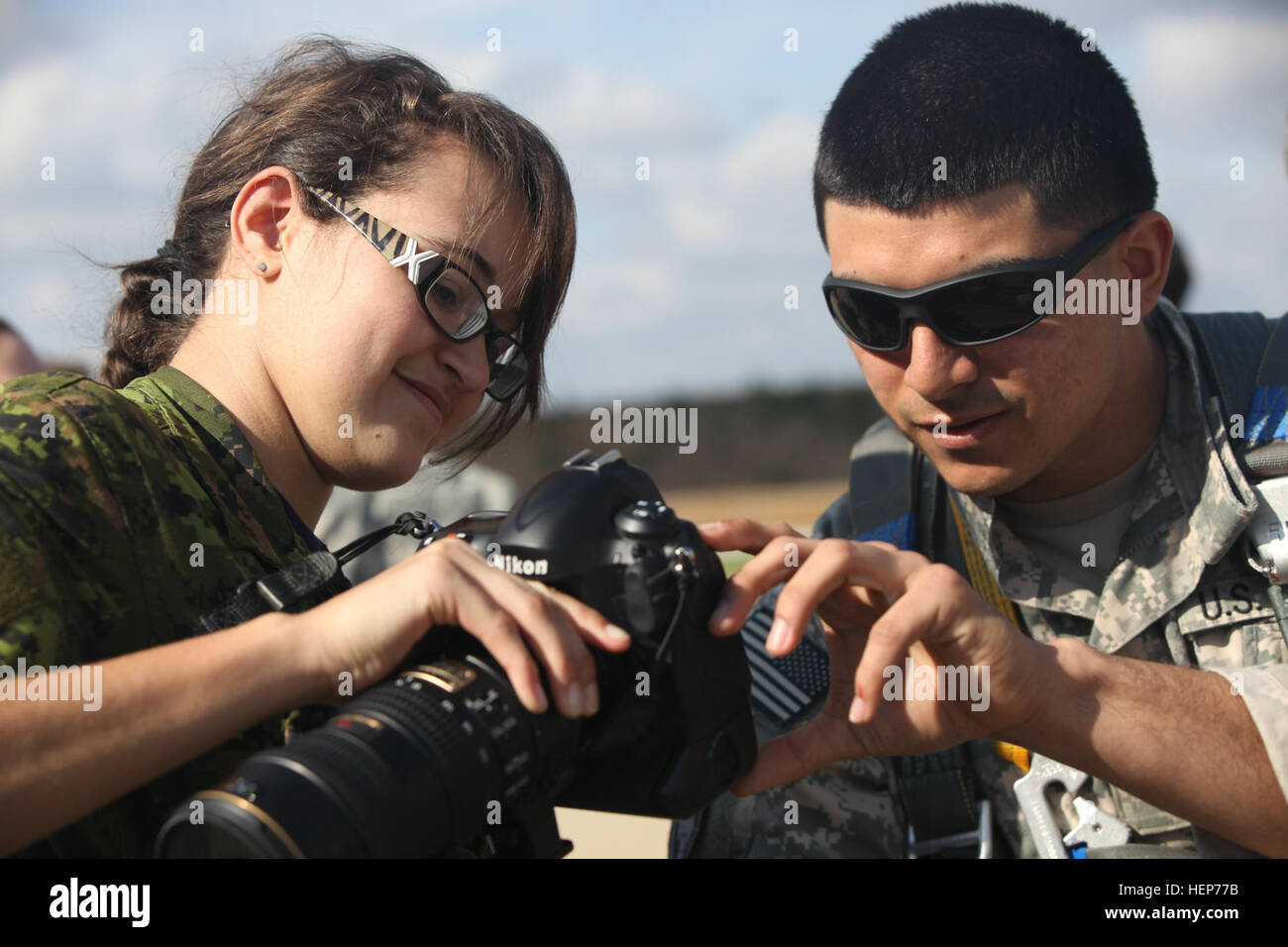 Canadian and U.S. Army Combat Camera members discuss imagery at Silver