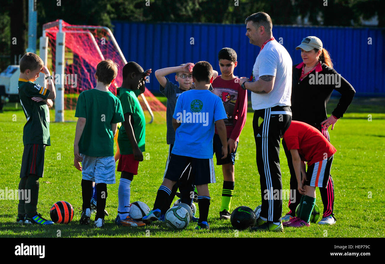 Sgt. Maj. Shawn Powell tells his players about their performance