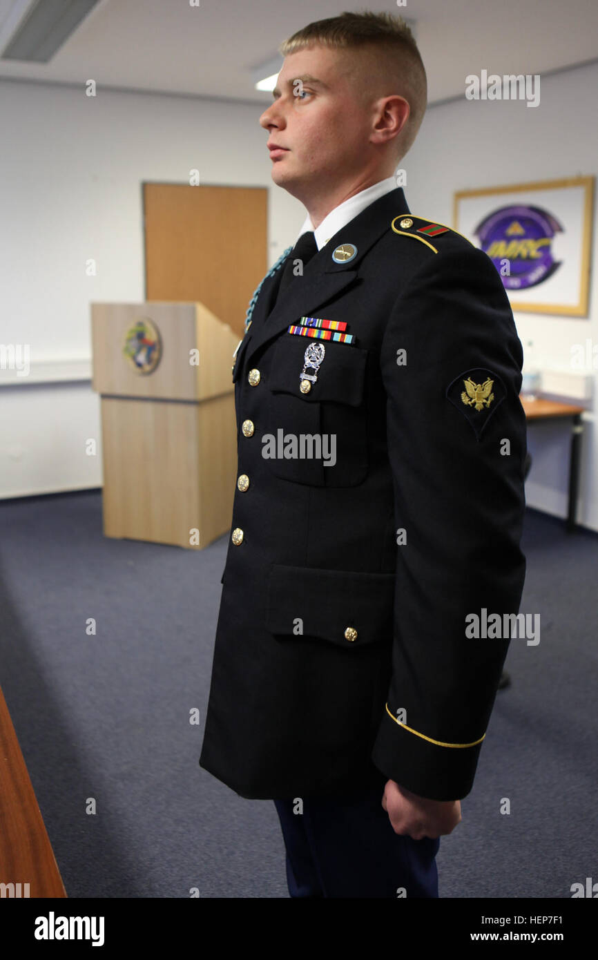 A U.S. Army Soldier from Alpha Company, 1st Battalion, 4th Infantry Regiment stands at attention during uniform inspection by board members at the Joint Multinational Readiness Center Best Warrior Competition in Hohenfels, A U.S. Army Soldier from Alpha Company, 1st Battalion, 4th Infantry Regiment stands at attention during uniform inspection by board members at the Joint Multinational Readiness Center Best Warrior Competition in Hohenfels,