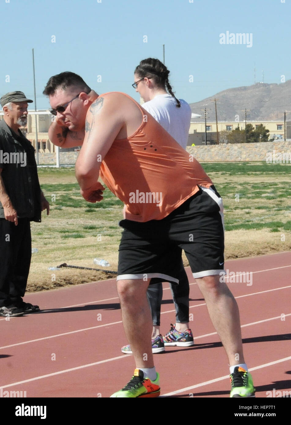 Sgt. Josh Andrews, retired, works through shot put mechanics the first day of training for the