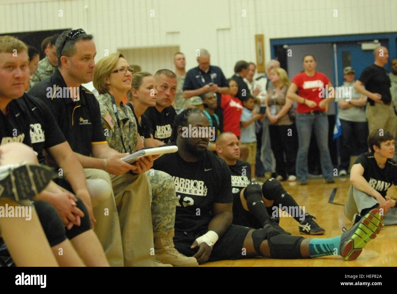 COLORADO SPRINGS, Colo. – Army Lt. Gen. Patricia D. Horoho, the 43rd Army Surgeon General and Commanding General of the Army Medical Command, watches the Army sitting volleyball team play on May 13, 2013 at the Olympic Training Center.  The Warrior Games are a weeklong annual event pitting 260 wounded, ill or injured service members from across the Department of Defense and United Kingdom against each other in seven sports: archery, cycling, shooting, sitting-volleyball, swimming, track and field and wheelchair basketball.  Warrior Games are representative of a valuable Warrior Care and Transi Stock Photo