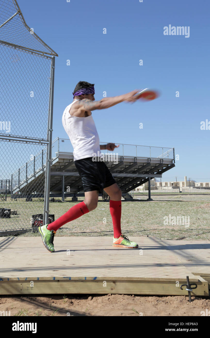 Soldiers and veterans practice discus throwing for the 2015 Army ...