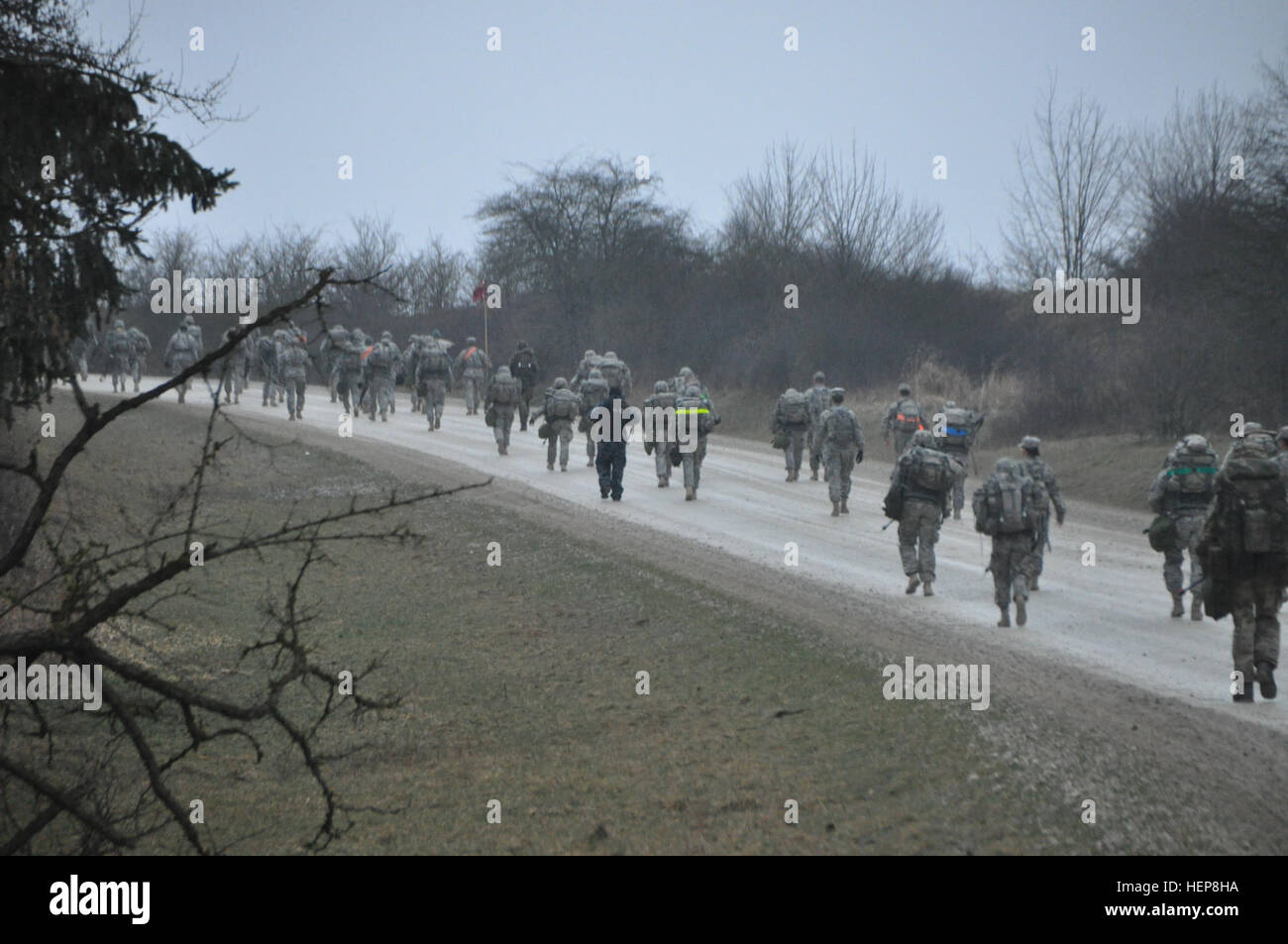 Seventy-four USAREUR EFMB candidates begin a 12-mile ruck march ...