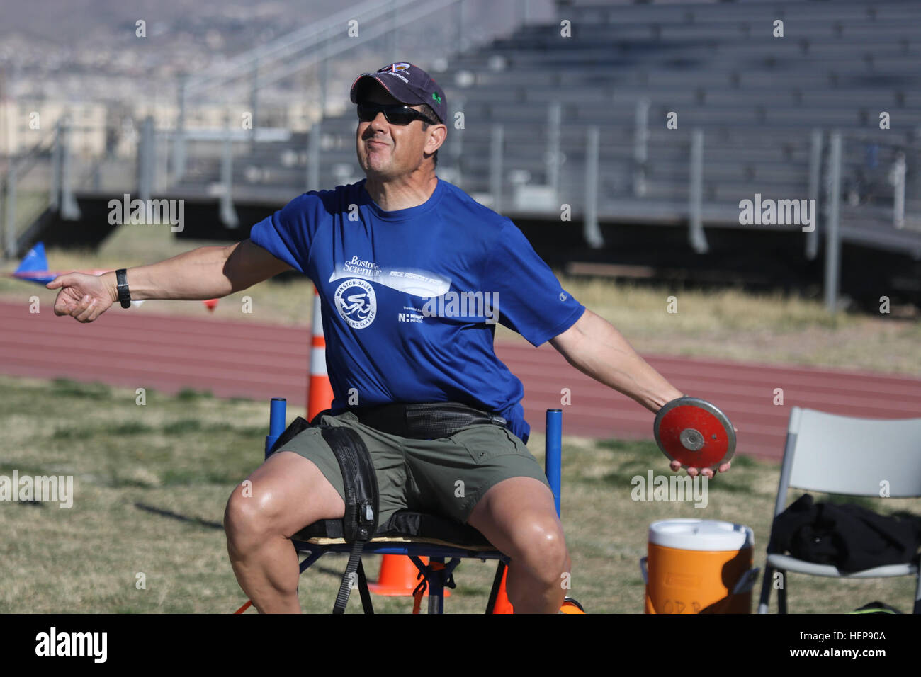 A U.S. Army veteran competes in seated discus during the 2015 Army ...