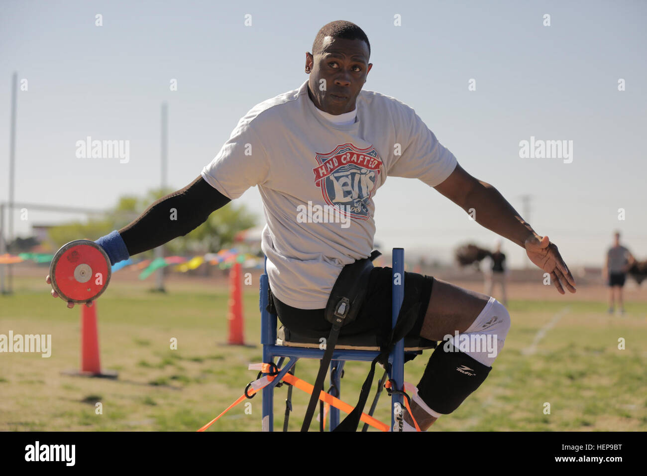U.S. Army veteran Staff Sgt. Alexander Shaw, Clarksville, Tenn., prepares to throw the discus during the 2015 Army Trials at Fort Bliss, Texas, April 1. Approximately 80 wounded, ill and injured Soldiers and veterans are at Fort Bliss to train and compete in a series of athletic events including archery, cycling, shooting, sitting volleyball, swimming, track, and field, and wheelchair basketball. Army Trials, March 29 - April 2, are conducted by the Army Warrior Transition Command and hosted by Fort Bliss. Army Trials help determine who will get a spot on the Department of Defense Warrior Game Stock Photo