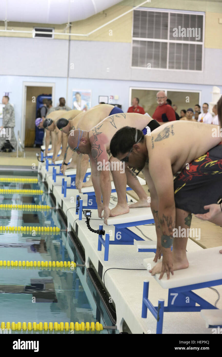 U.S. Army Active Duty and Reserve athletes set their blocks during the ...