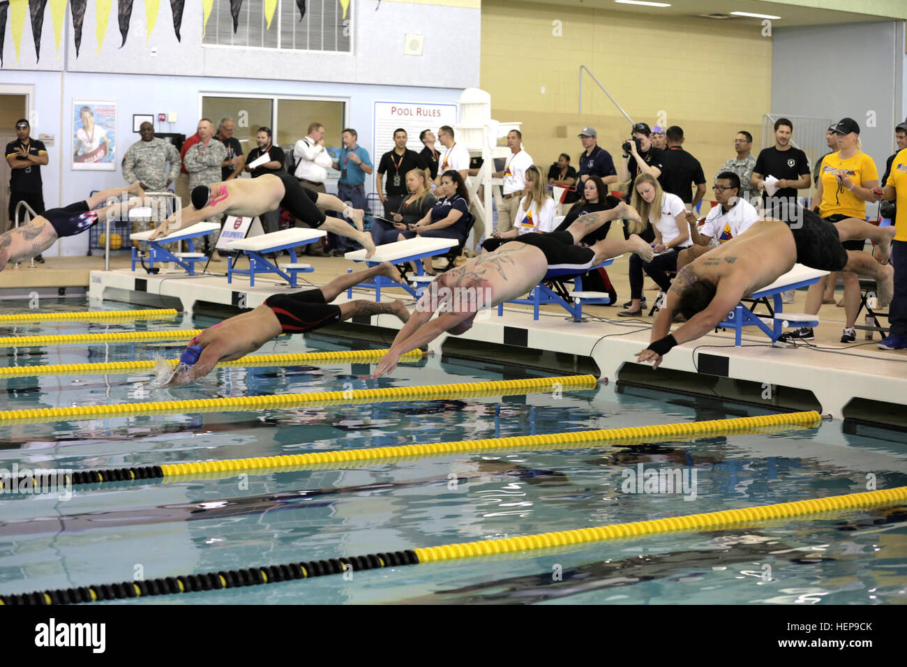 U.S. Army Active and Reserve athletes dive into the water during the ...