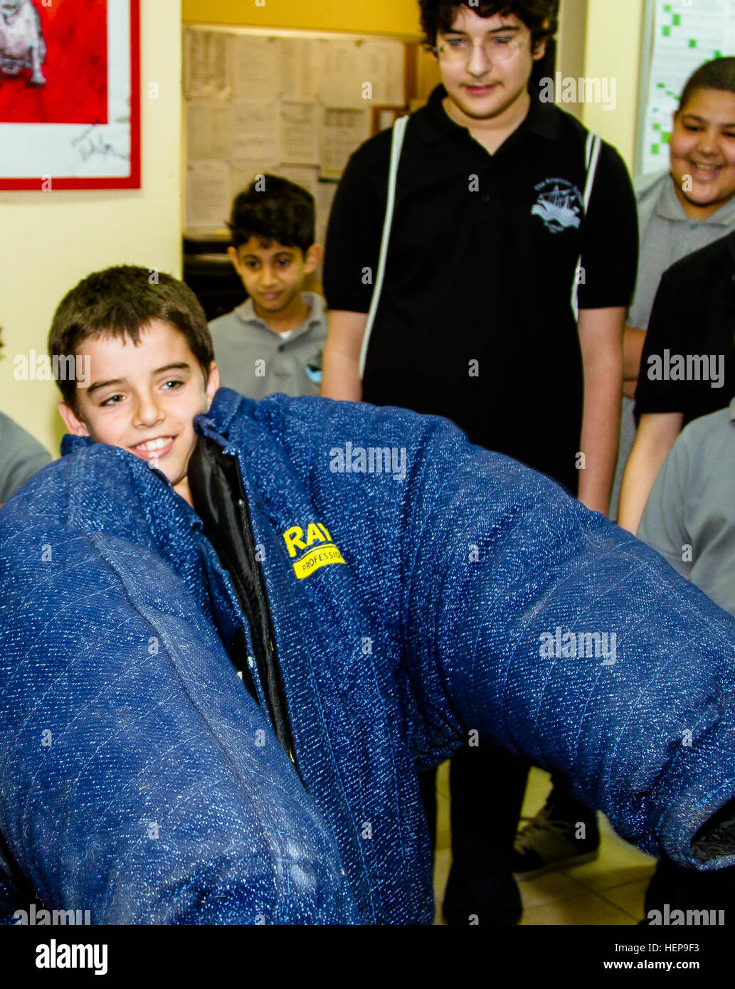 A student from the American school of Kuwait wears the ‘bite suit’ at