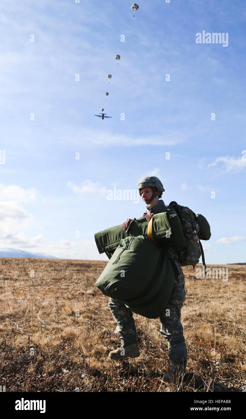 Operation Rally Point Army A U.S. Army service member marches to a rally point after a parachute ...
