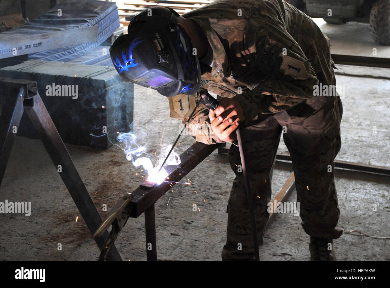 U.S. Army Sgt. Christopher Cates, a welder in Company G, 201st ...