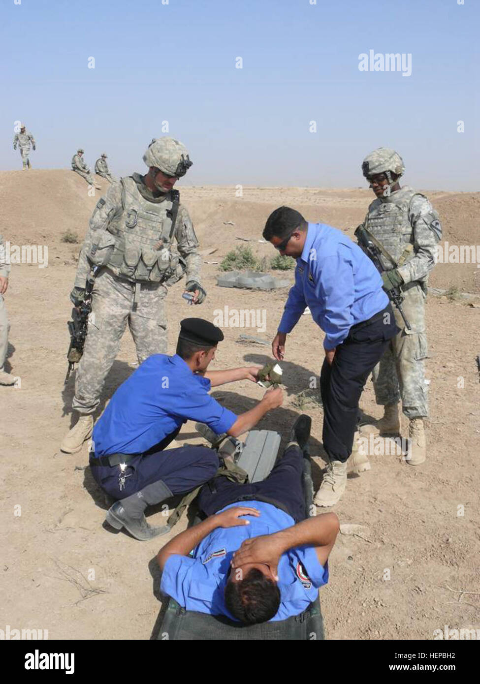 Combat medics from 1st Squadron, 7th Cavalry Regiment observe and ...