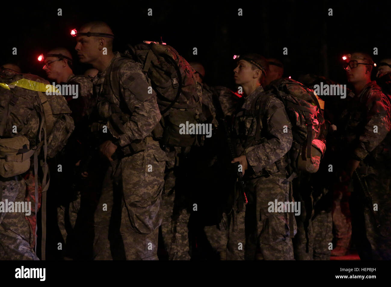 U.S. Army Soldiers conduct a 12 mile foot march during the Ranger