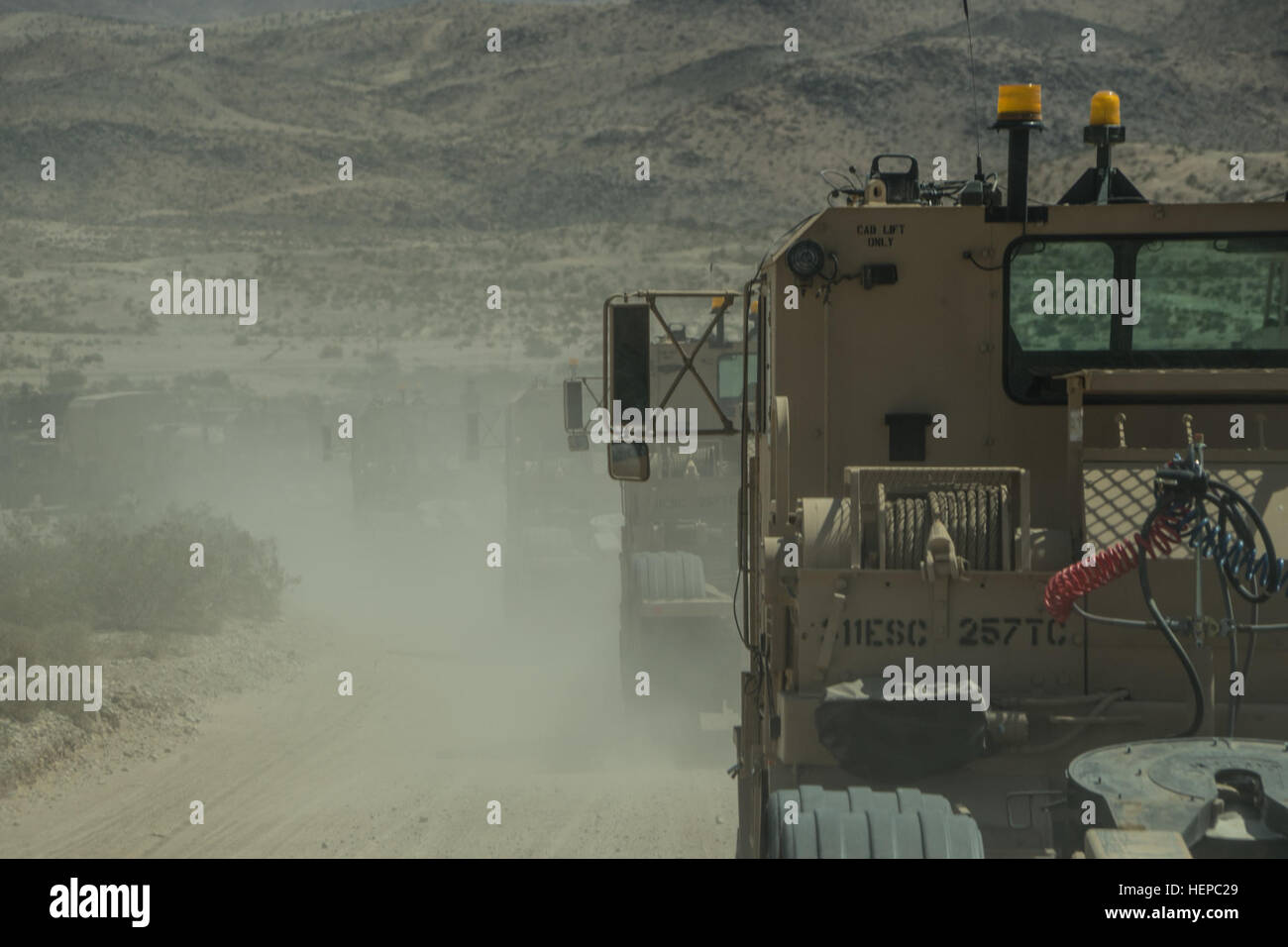 The 257th Transportation Company supports a National Training Center at Fort Irwin, Calif., with their M1070A1 Heavy Equipment Transporter trucks in April and May 2015. Army Reserve unit moves heavy equipment at the NTC 150430-A-AU937-953 Stock Photo