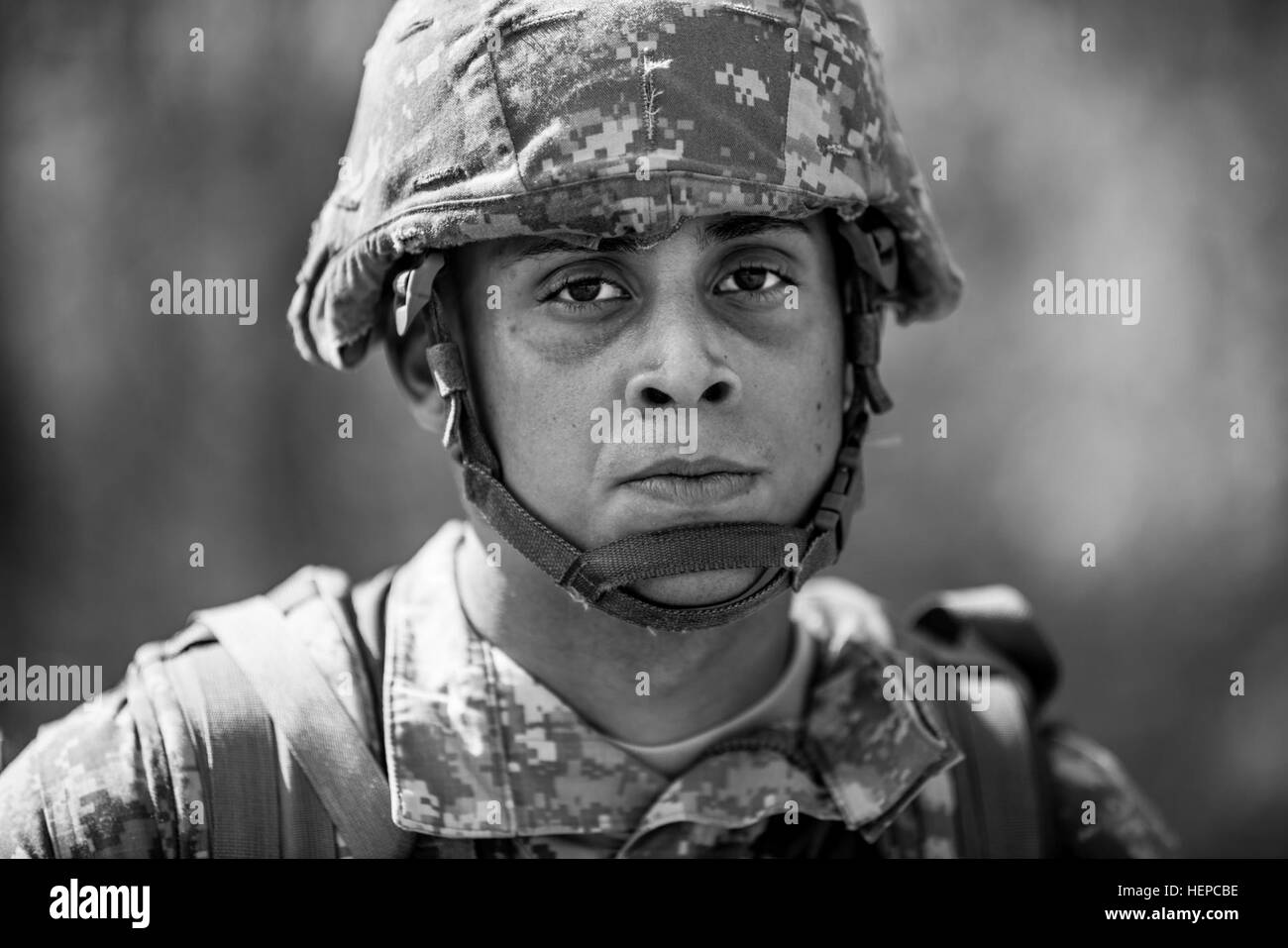 Spc. Standrich Granell Quiles, from Mayaguez, Puerto Rico, with 268th Transportation Company, stands for a portrait after finishing a 10-kilometer foot march in the North Carolina heat May 5 during the 2015 Army Reserve Best Warrior Competition at Fort Bragg. This year's Best Warrior Competition will determine the top noncommissioned officer and junior enlisted Soldier who will represent the Army Reserve in the Department of the Army Best Warrior Competition later this year at Fort Lee, Va. (U.S. Army photo by Sgt. 1st Class Michel Sauret) 2015 Army Reserve Best Warrior Competition 150505-A-TI Stock Photo