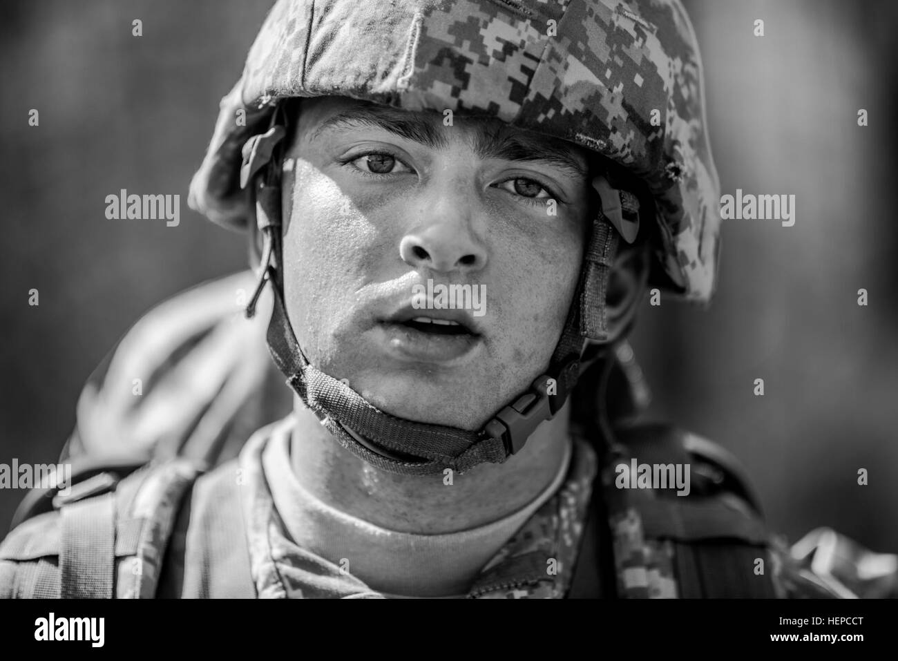 Spc. Adam L. Job, a medical laboratory specialist with the 4225th U.S. Army Hospital, Fort Harrison, Montana, stands for a portrait after finishing a 10-kilometer foot march in the North Carolina heat May 5 during the 2015 Army Reserve Best Warrior Competition at Fort Bragg. This year's Best Warrior Competition will determine the top noncommissioned officer and junior enlisted Soldier who will represent the Army Reserve in the Department of the Army Best Warrior Competition later this year at Fort Lee, Va. (U.S. Army photo by Sgt. 1st Class Michel Sauret) 2015 Army Reserve Best Warrior Competi Stock Photo