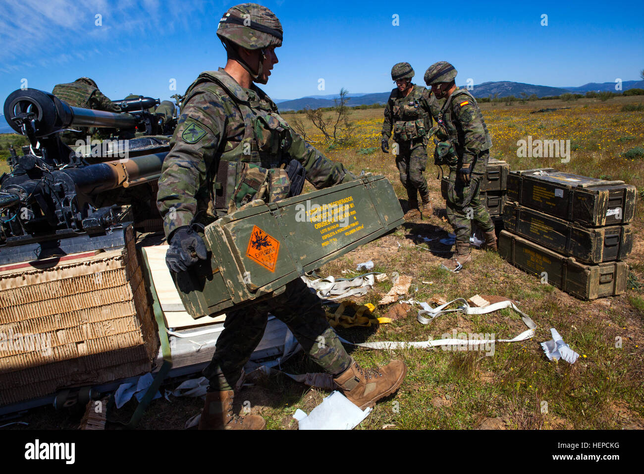 Spanish Soldiers from the Brigada Paracaidista recover ammunition following an airborne cargo drop during Operation Skyfall - España, Madrid, Spain, May 7, 2015. Operation Skyfall - España is an exercise initiated and organized by the 982nd Combat Camera Company, and hosted by the Brigada Paracaidista of the Spanish army. The exercise is a bilateral subject matter exchange focusing on interoperability of combat camera training and documentation of airborne operations.  (U.S. Army photo by Staff Sgt. Justin P. Morelli / Released) Operation Skyfall - Espa%%%%%%%%C3%%%%%%%%B1a 150507-A-PP104-184 Stock Photo