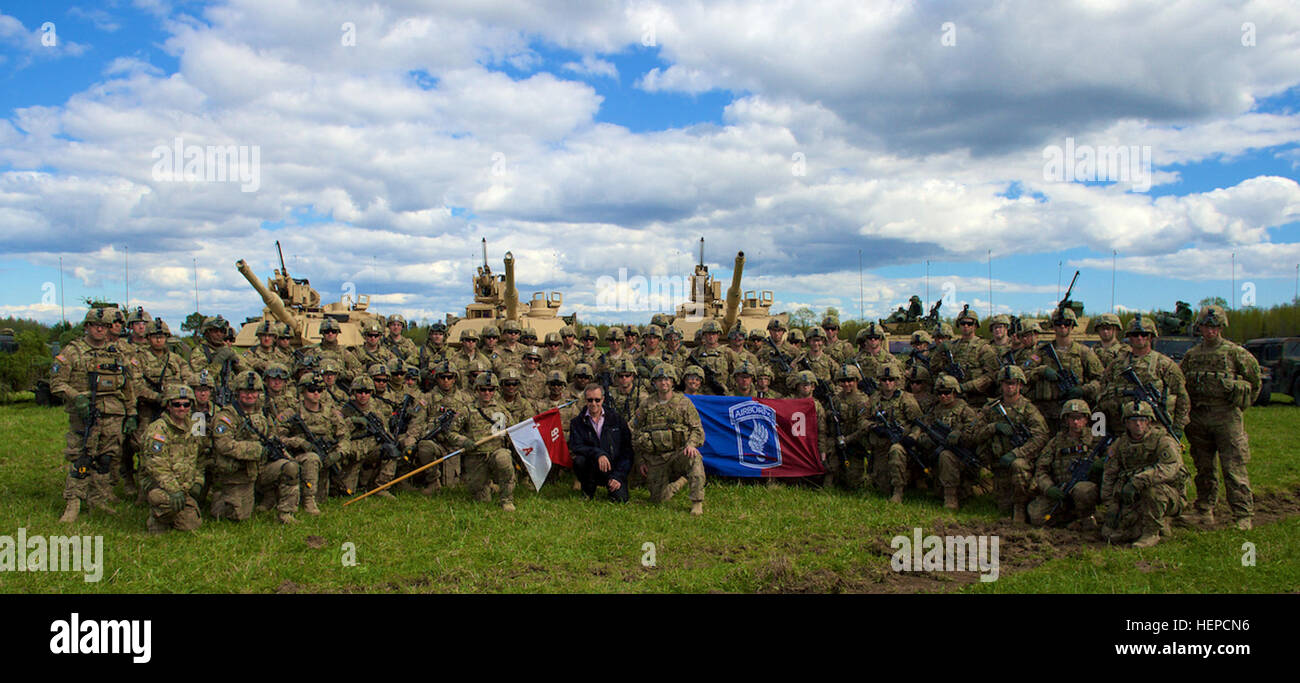 The President of Estonia Toomas Hendrik Ilves and A Troop, 1st Squadron, 91st Cavalry Regiment, 173rd Airborne Brigade out of Grafenwöhr, Germany, pose for a photo during Operation Siil held in Johvi, Estonia, May 9. Soldiers from 173rd and C Company, 2nd Battalion, 7th Infantry Regiment, 3rd Infantry Division out of Fort Stewart, Ga., are currently deployed throughout Europe as part of Operation Atlantic Resolve, an ongoing, multinational partnership focused on joint training and security cooperation between the U.S. and other NATO allies. (Photo by U.S. Army Staff Sgt. Brooks Fletcher, 16th  Stock Photo