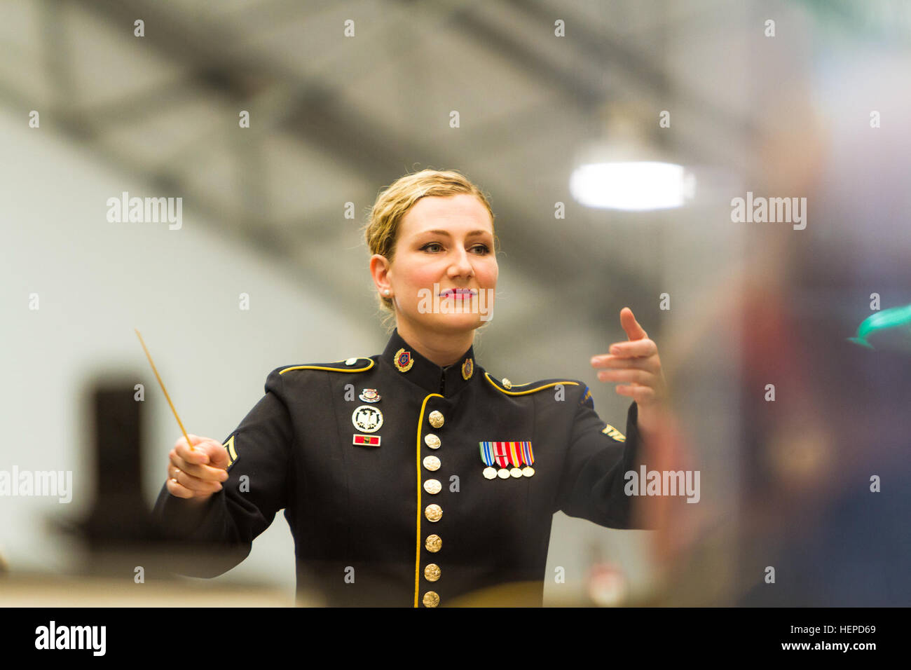 The U.S. Army Field Band conductor directs the ensemble during the 29th