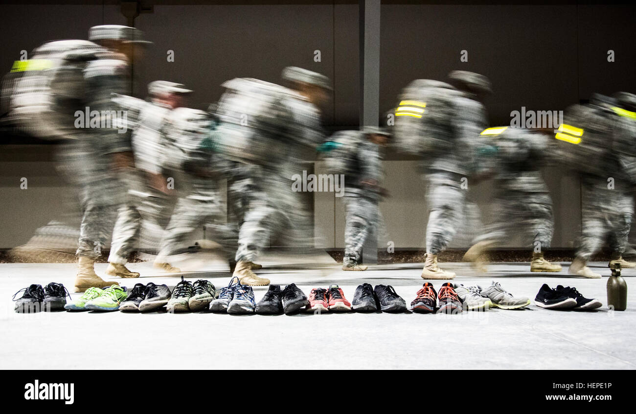 Desert Warrior students complete a ruck-run-ruck as part of the initial physical fitness assessment for the inaugural Desert Warrior class, at Fort Bliss, Texas, June 3, 2015. Desert Warrior is the Army’s newest leadership school spearheaded by the Iron Training Detachment, 1st Armored Division. It is the Army’s first purely desert course since the desert phase of Ranger School discontinued it in 1995. (U.S. Army photo by: Sgt. Marcus Fichtl) Desert Warrior, Army's newest school 150603-A-TW035-154 Stock Photo