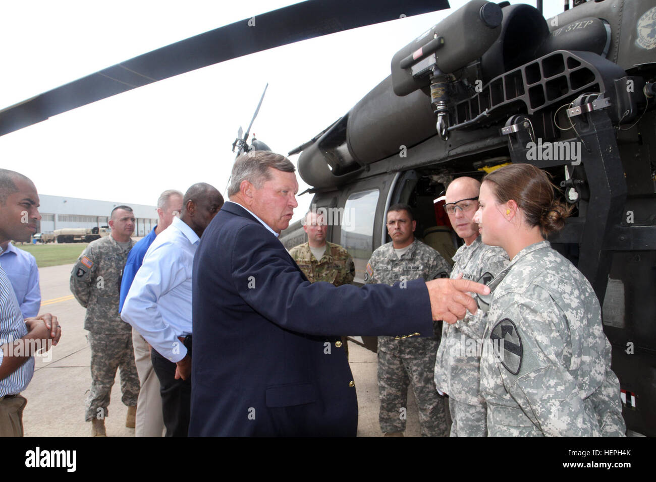 Retired Gen. James Thurman (left), a member of the National Commission