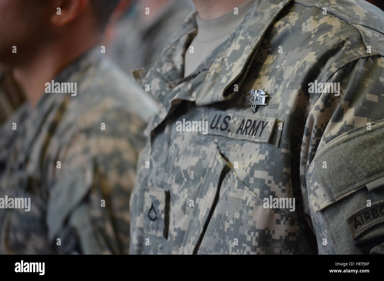 Pfc. Arron R. Juopperi, Headquarters and Headquarters Company, 1st Battalion, 26th Infantry Regiment, 2nd Brigade Combat Team, 101st Airborne Division (Air Assault), stands proudly in formation after being pinned his Expert Field Medical Badge at the Lozado Physical Fitness Center here, Aug. 6, 2015. The Expert Field Medical Badge has a 15 percent success rate amongst its potential candidates. (U.S. Army photo by Staff Sgt. Sierra A. Fown, 2nd Brigade Combat Team, 101st Airborne Division Public Affairs) The 3 percenters %%%%%%%%E2%%%%%%%%80%%%%%%%%93 Earning the EFMB 080615-A-PB256-177 Stock Photo