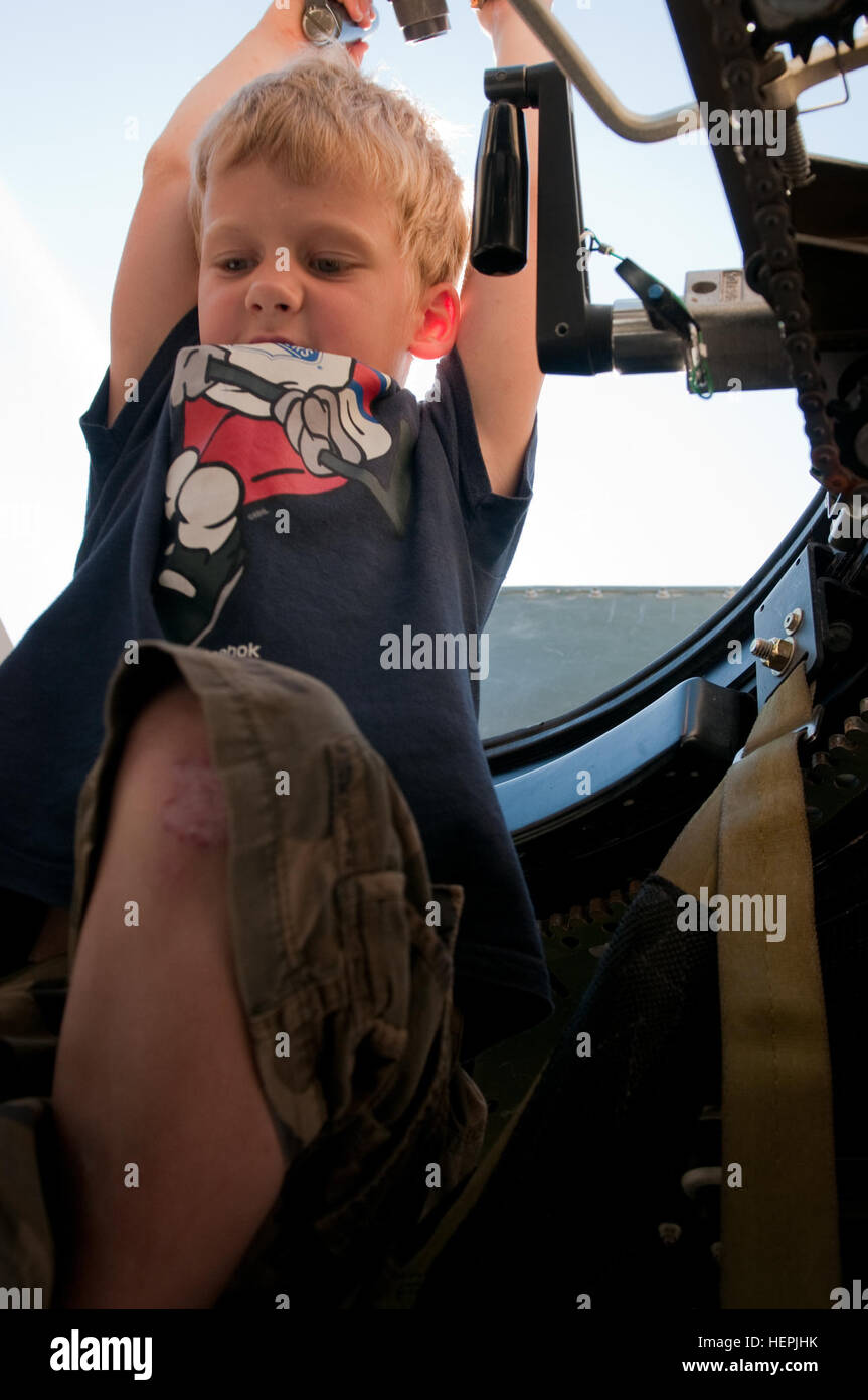 A young Estonian boy finds his way through the gunner’s hatch of a