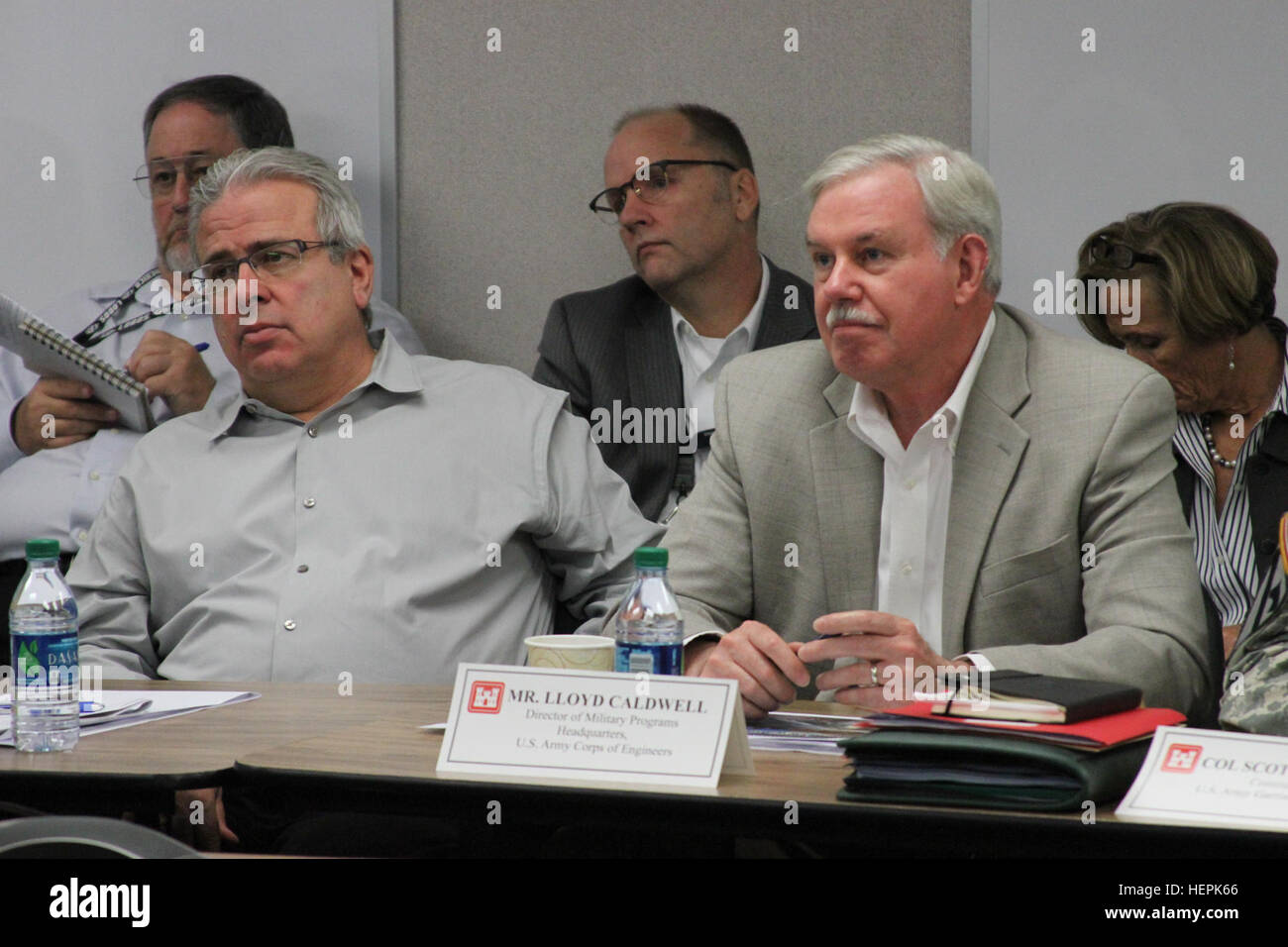 Joe Calcara, director of programs, USACE South Pacific Division, and the senior executive project manager for the U.S. Army Corps of Engineers Fort Irwin Weed Army Hospital replacement construction project and USACE director of Military Programs Lloyd Caldwell listen to briefers during the quarterly SERG. USACE senior leaders visit Fort Irwin Hospital project 150922-A-AB280-004 Stock Photo