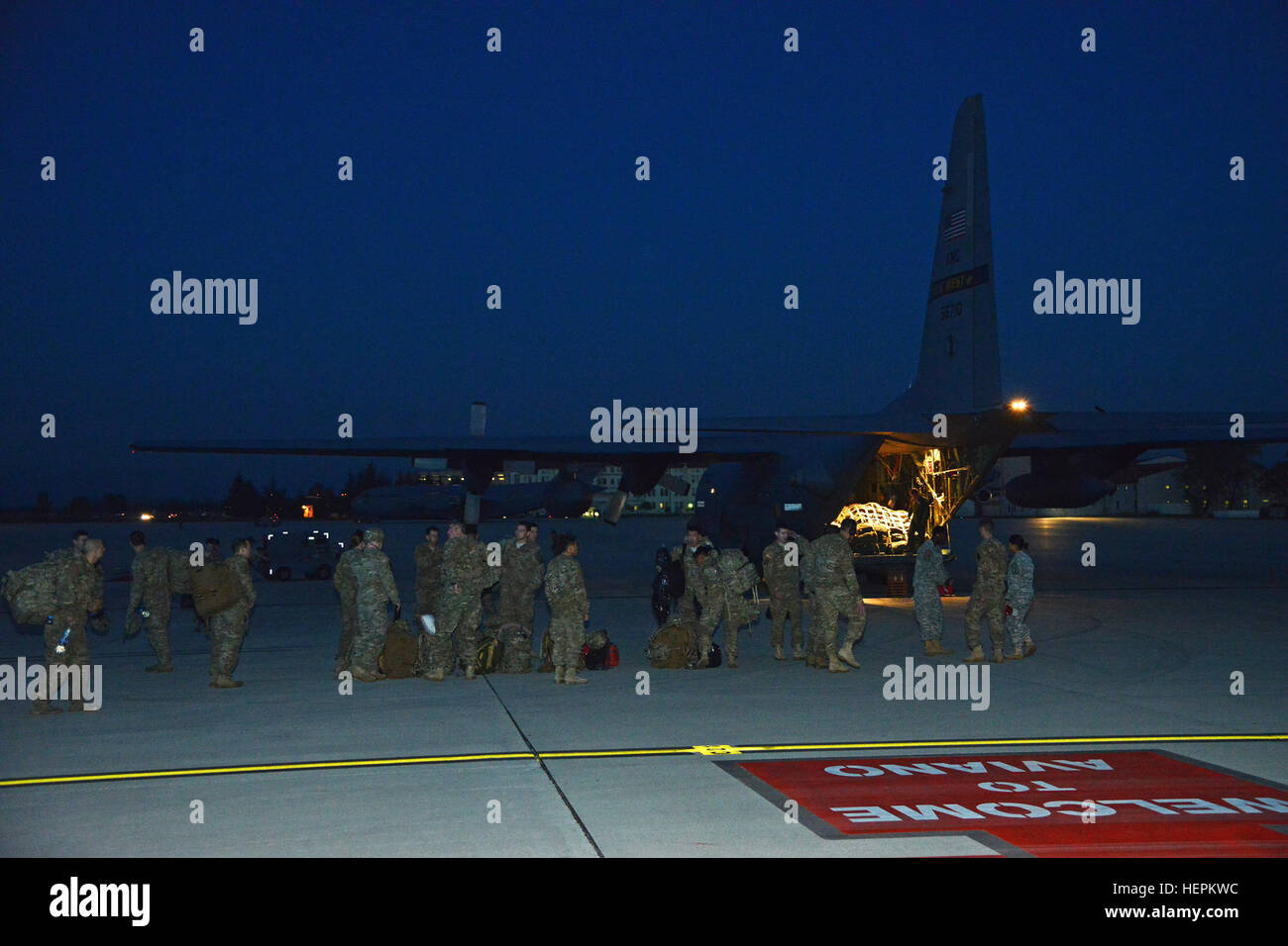 U.S. paratroopers of the 1st Battalion, 503rd Infantry Regiment, 173rd Airborne Brigade arrive at Aviano Air Base, Italy, after five months  training in Lithuania during Operation Atlantic Resolve, on board a U.S. Air Force West Virginia Air National Guard C-130 Hercules aircraft, Nov 3, 2015. The 173rd Airborne Brigade is the Army Contingency Response Force in Europe, capable of projecting ready forces anywhere in the U.S. European, Africa or Central Commands areas of responsibility within 18 hours. (U.S. Army photo by Visual Information Specialist Paolo Bovo/Released) Bayonet Thrust 151103-A Stock Photo