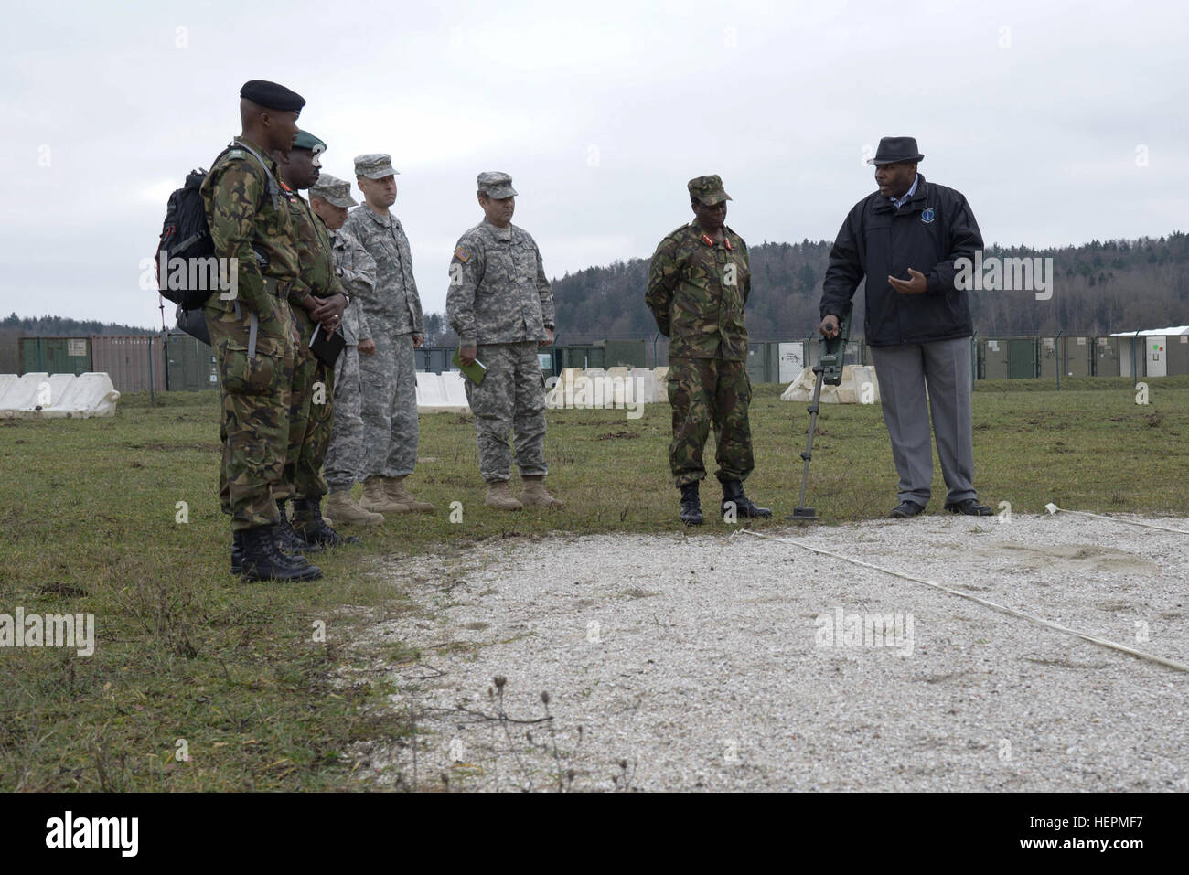 Members of the Botswana Defense Force receive instruction on detecting improvised explosive devices as part of a Counter IED brief during a command-sponsored visit to the Joint Multinational Readiness Center in Hohenfels, Germany, Dec. 3, 2015. The visit allowed leadership from Botswana to observe facilities and capabilities to explore future opportunities for training and partnership. (U.S. Army photo by Spc. Nathanael Mercado/Released) USARAF Botswana JMRC-JMTC visit 151203-A-DN311-087 Stock Photo