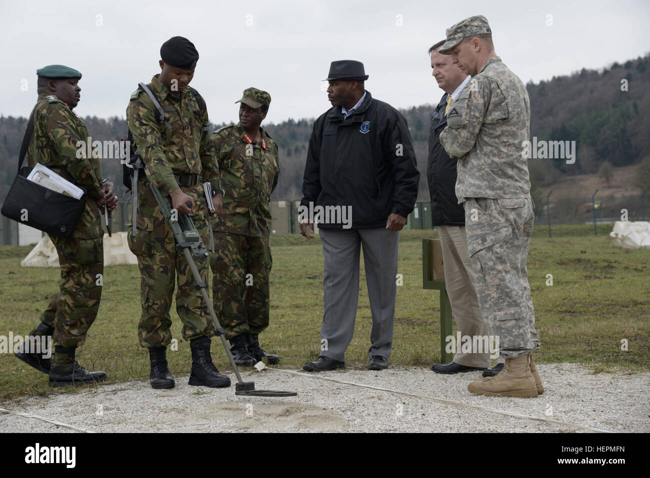 Members of the Botswana Defense Force receive instruction on detecting improvised explosive devices as part of a Counter IED brief during a command-sponsored visit to the Joint Multinational Readiness Center in Hohenfels, Germany, Dec. 3, 2015. The visit allowed leadership from Botswana to observe facilities and capabilities to explore future opportunities for training and partnership. (U.S. Army photo by Spc. Nathanael Mercado/Released) USARAF Botswana JMRC-JMTC visit 151203-A-DN311-097 Stock Photo