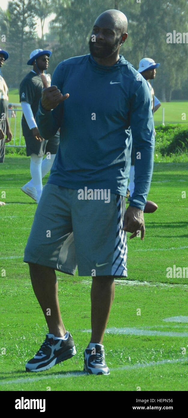 Hall of Fame football player Jerry Rice gives a "shaka" to the fans