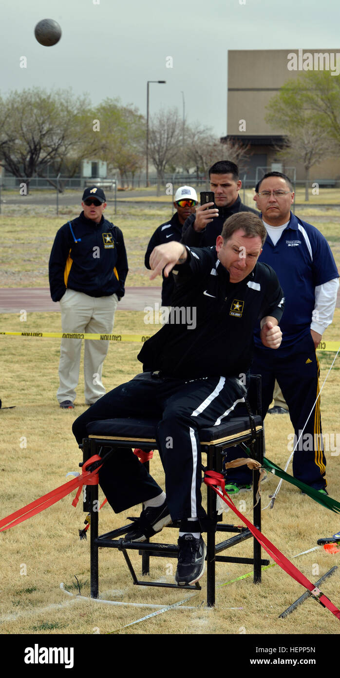 U.S. Army Staff Sgt. Mathew Scholten, Warrior Transition Unit, Fort Riley, Kan., launches a shot put at the 2016 U.S. Army Trials field competition at Stout track, Fort Bliss, Texas, March 8. More than 100 wounded, ill and injured Soldiers and veterans are at Fort Bliss to train and compete in a series of athletic events including archery, cycling, shooting, sitting volleyball, swimming, track and field, and wheelchair basketball. Army Trials, March 6-10, are conducted by the Department of Defense Warrior Games 2016 Army Team. Approximately 250 athletes, representing teams from the Army, Marin Stock Photo