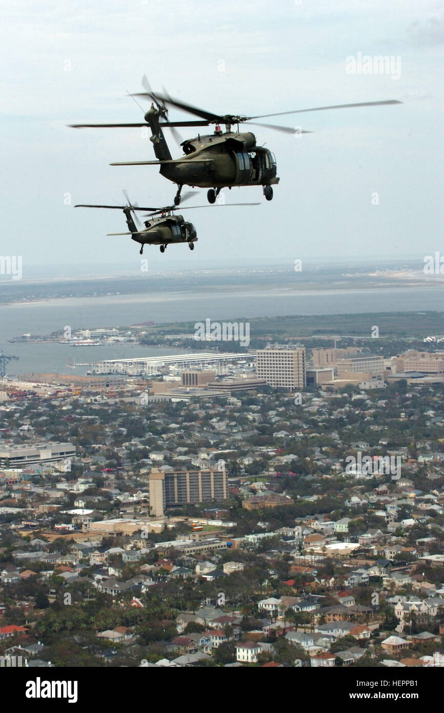 Two UH-60 Black Hawk helicopters from 2nd Battalion, 227th Aviation Regiment, 1st Air Cavalry Brigade, 1st Cavalry Division, fly Gen. Victor Renuart Jr., the commanding general of U.S. Northern Command, and his staff over Galveston, Texas and the surrounding areas during an aerial assessment of the damage left in the wake of Hurricane Ike, Sept. 15, 2008. Air Cav Brigade takes on Hurricane Ike aftermath 116197 Stock Photo