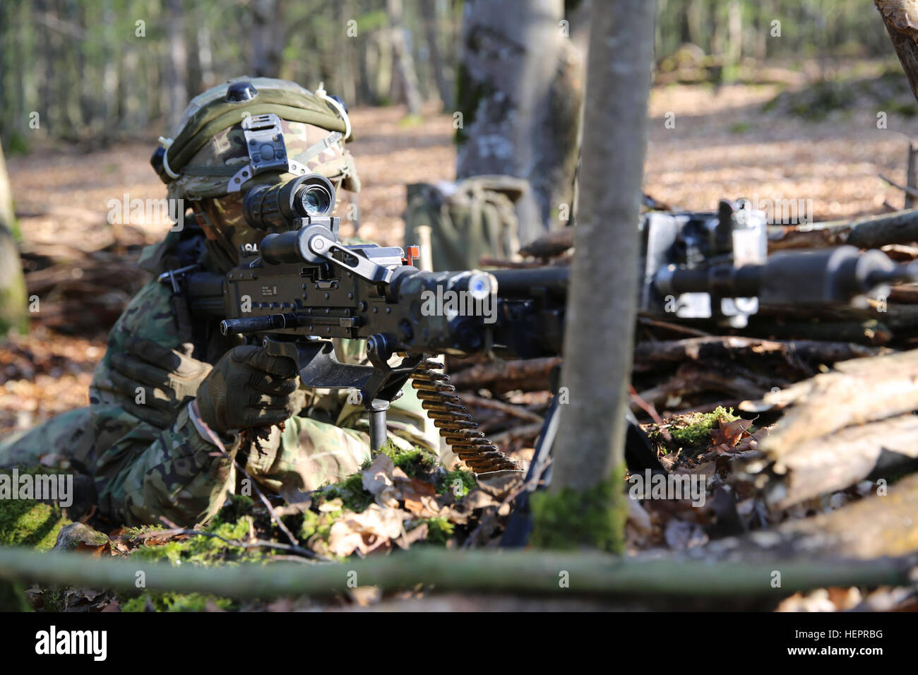 U.S. Army Pfc. Jonathan Beemer of 1st Battalion, 503rd Airborne Infantry Regiment, 173rd Airborne Brigade sets perimeter security while conducting defensive operations during exercise Saber Junction 16 at the U.S. Army’s Joint Multinational Readiness Center (JMRC) in Hohenfels, Germany, April 19, 2016. Saber Junction 16 is the U.S. Army Europe’s 173rd Airborne Brigade’s combat training center certification exercise, taking place at the JMRC in Hohenfels, Germany, Mar. 31-Apr. 24, 2016.  The exercise is designed to evaluate the readiness of the Army’s Europe-based combat brigades to conduct uni Stock Photo
