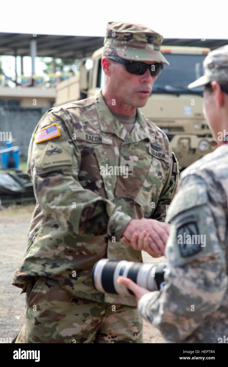 U.S. Army Brig. Gen. Gregrey Bacon, with the Arkansas National Guard visits the medical readiness exercise, in La Blanca, Guatemala, May 24, 2016.Task Force Red Wolf and Army South conducts Humanitarian Civil Assistance Training to include tactical level construction projects and Medical Readiness Training Exercises providing medical access and building schools in Guatemala with the Guatemalan Government and non-government agencies from 05MAR16 to 18JUN16 in order to improve the mission readiness of US Forces and to provide a lasting benefit to the people of Guatemala. (U.S. Army photo by Spc. Stock Photo