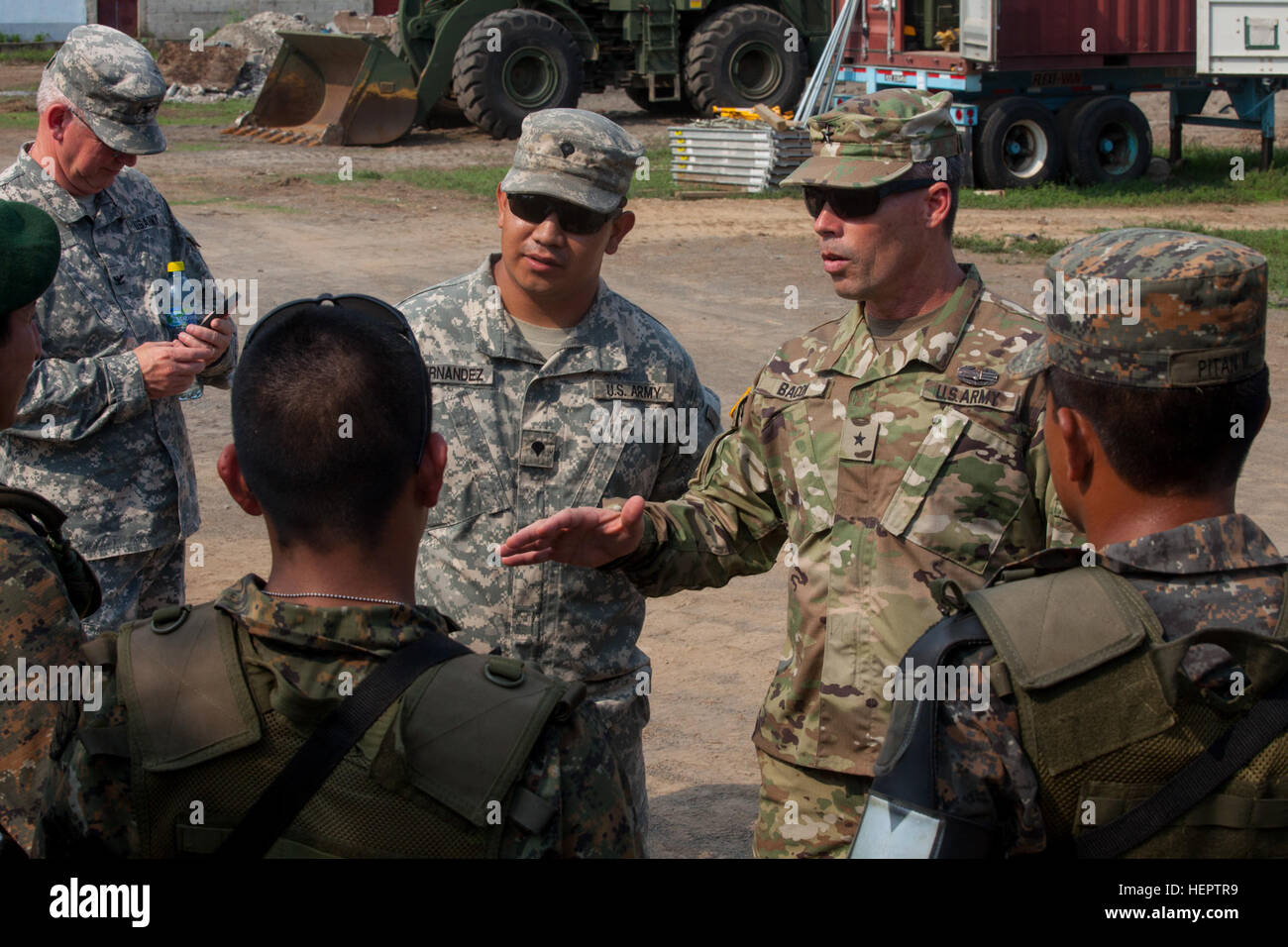 U.S Army Brig. Gen. Gregrey Bacon of the Arkansas National Guard speaks with soldiers of the Guatemalan Mountain Brigade at La Blanca, Guatemala, May 24,2016. Task Force Red Wolf and Army South conducts Humanitarian Civil Assistance Training to include tatical level construction projects and medical readiness Training Exercises providing medical access and building schools in guatemala with the Guatamalan Government and non government agencies from 05Mar16 to 18JUN16 in order to improve the mission readiness of US Forces and to provide a lasting benefit to the people to Guatemala. (U.S. Army p Stock Photo