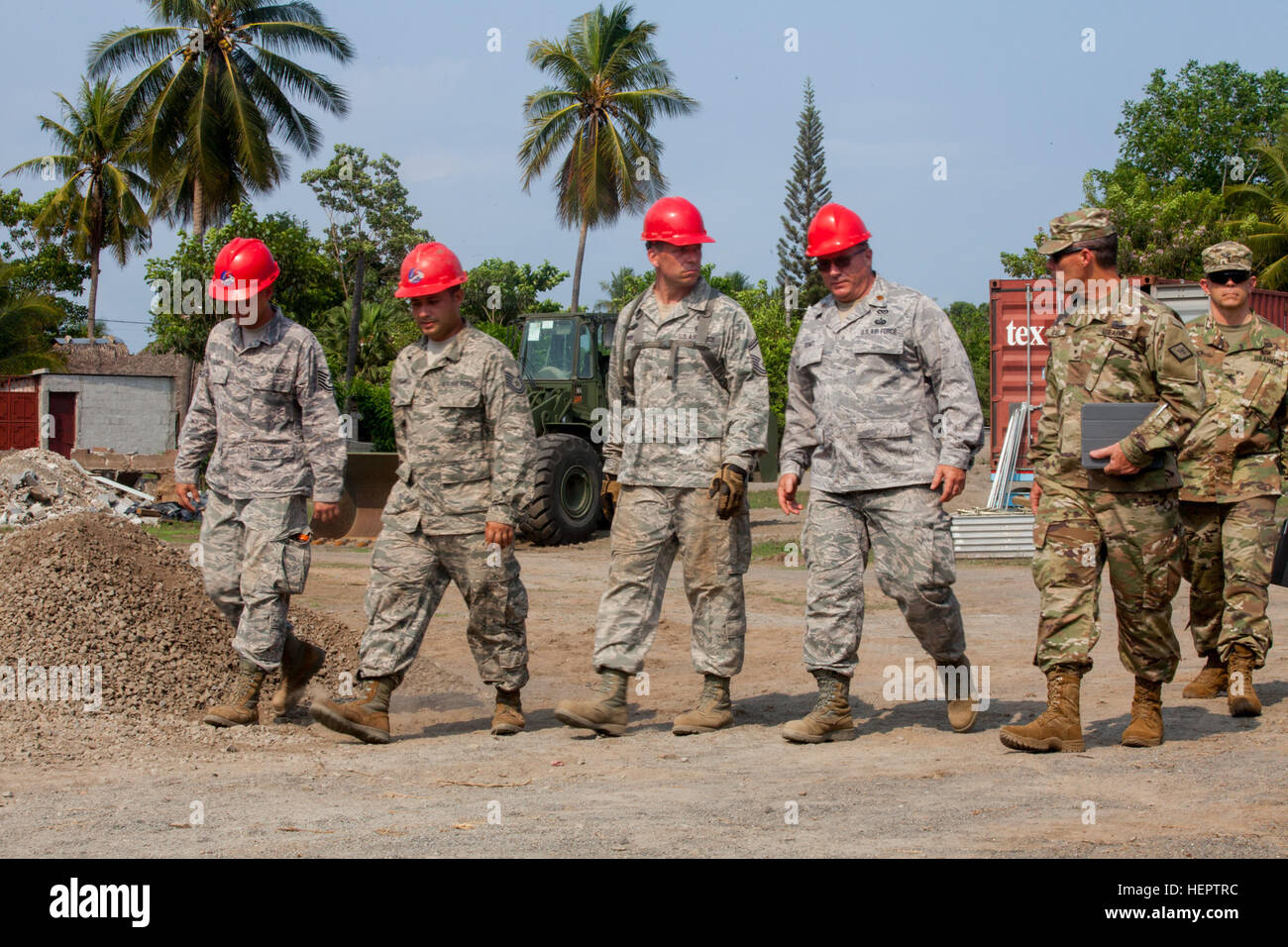 U.S. Army Brig. Gen. Gregrey Bacon of the Arkansas National Guard is guided by joint services through a construction site in La Blanca, Guatemala, May 24,2016. Task Force Red Wolf and Army South conducts Humanitarian Civil Assistance Training to include tatical level construction projects and medical readiness Training Exercises providing medical access and building schools in guatemala with the Guatamalan Government and non government agencies from 05Mar16 to 18JUN16 in order to improve the mission readiness of US Forces and to provide a lasting benefit to the people to Guatemala. (U.S. Army  Stock Photo