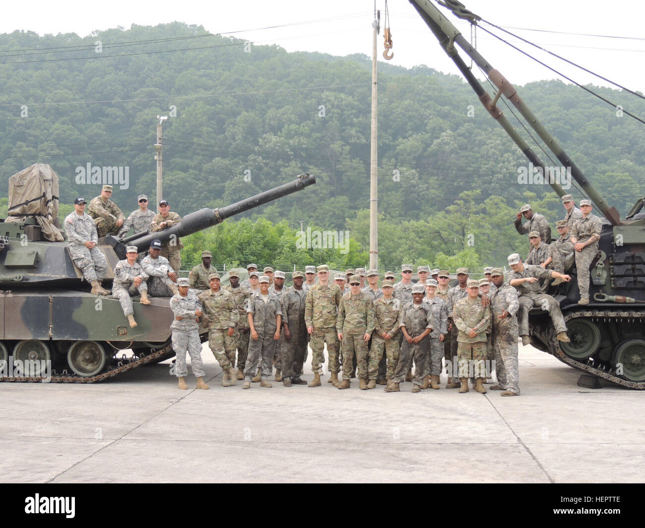 Soldiers of maintenance platoon from FSC H, 2nd Battalion, 5th Cavalry Regiment, 1st Armored Brigade Combat Team, 1st Cavalry Division, pose for a group photograph after the completion of the three day Maintenance Table VI that took place on Camp Casey, South Korea from May 23 -25. Forty Soldiers from FSC H participate in Maintenance Table VI and will conduct Maintenance Table XII in August. (U.S. Army photo by CPT Joseph Best, FSC H Commander, 2nd Bn., 5th Cav. Reg., 1st Armored Brigade Combat Team) One Big Family 160525-A-XX123-004 Stock Photo