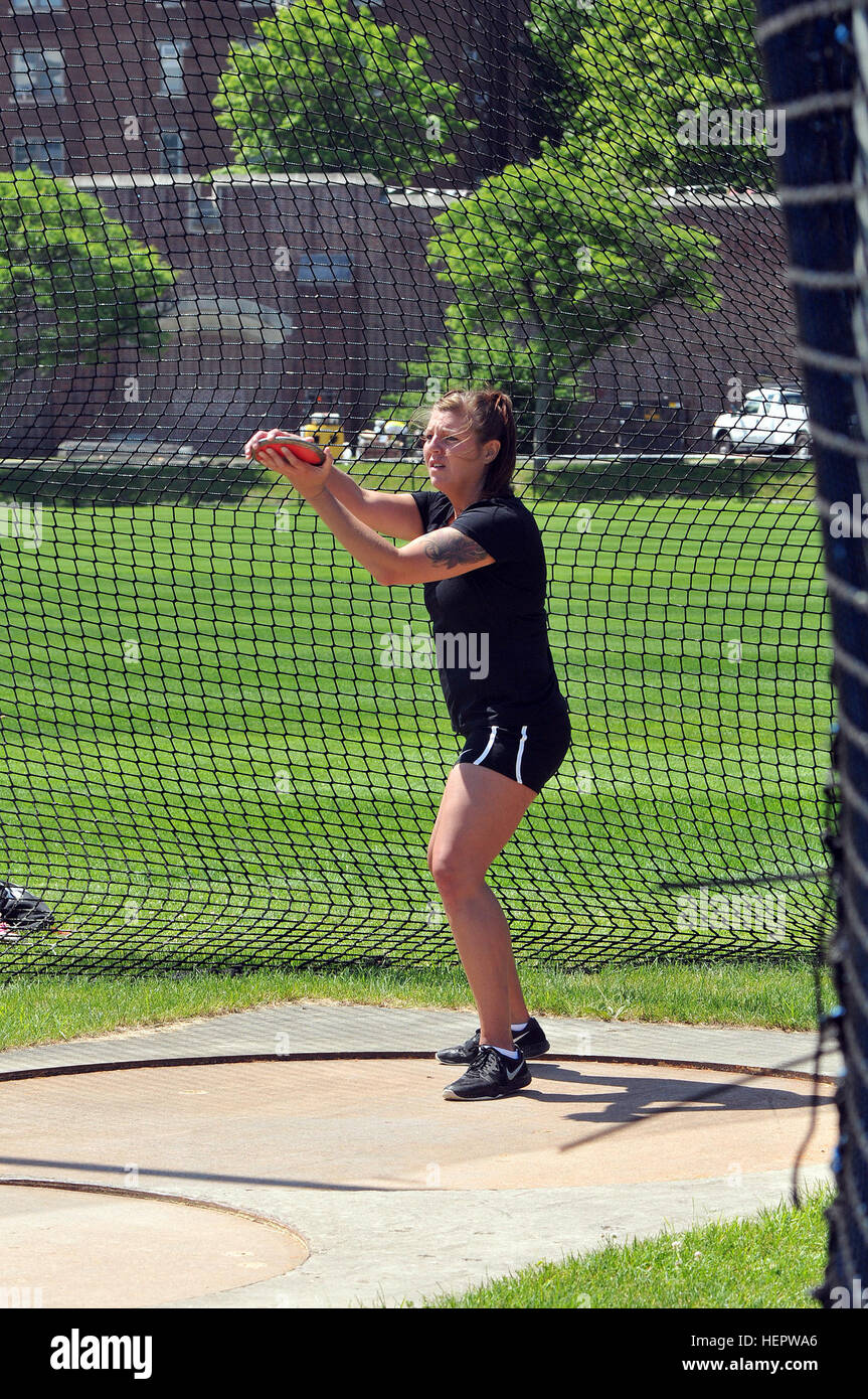 U.S. Army Reserve Staff Sgt. Ashley Anderson prepares to throw a discus during field training for the 2016 Department of Defense Warrior Games being held at the United States Military Academy at West Point, N.Y., June 9, 2016. Anderson is a member of the U.S. Army Reserve's 339th Military Police Company, based in Davenport, Iowa, and is currently assigned to the Fort Riley, Kansas, Warrior Transition Battalion. The DoD Warrior Games, June 15-21, is an adaptive sports competition for wounded, ill and injured service members and Veterans. Athletes representing teams from the Army, Marine Corps,  Stock Photo