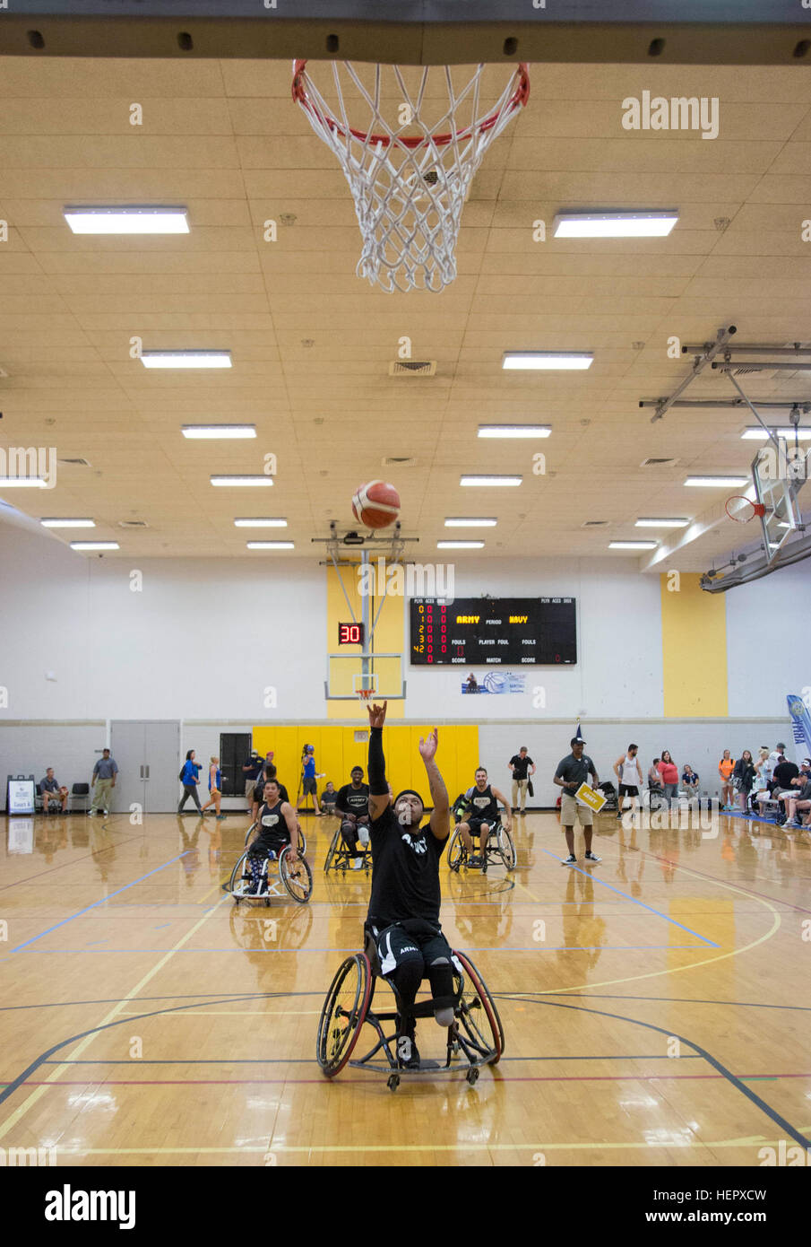 U.S. Army Veteran, Spc. Darron Lewis, of Cleveland Ohio, shoots a free-throw during a basketball match during the 2016 Department of Defense Warrior Games in Arvin Gym, at the United States Military Academy, at West Point, New York, June 18. (U.S. Army photo by Spc. Sarah Pond/Released) DoD Warrior Games 2016 160618-A-SQ797-178 Stock Photo