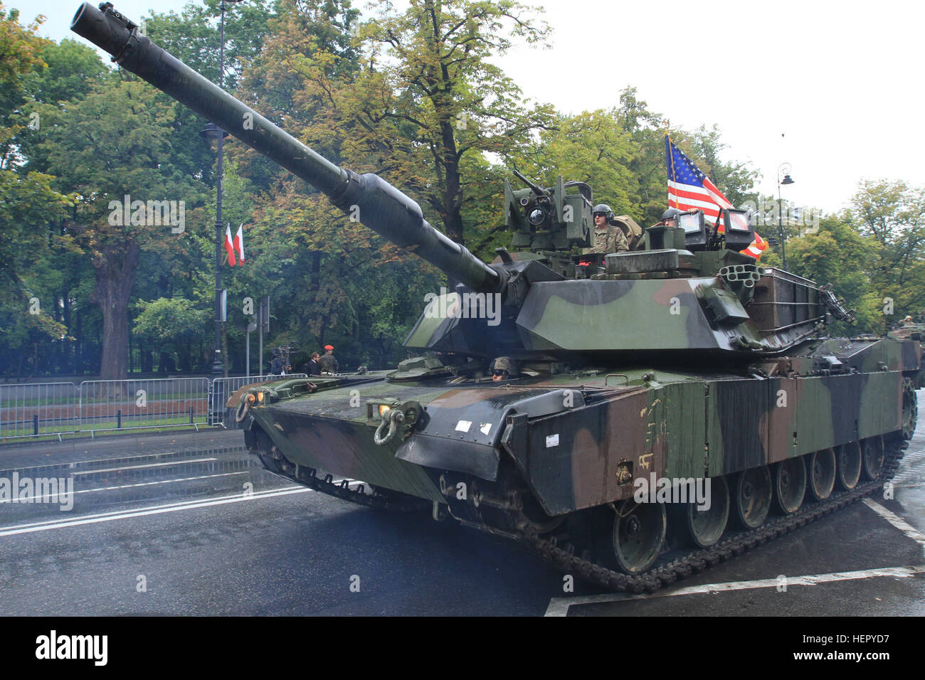 WARSAW, Poland – Soldiers of Company D, 3rd Combined Arms Battalion, 69th Armor Regiment, 3rd Infantry Division, based out of Ft. Stewart, Ga., drive a M1A2 Abrams tank during the Polish Armed Forces Day Parade in Warsaw, Poland, Aug. 15, 2016. The parade, held annually in the capital, commemorates the 96th anniversary of the Polish victory over Soviet Russia at the Battle of Warsaw in 1920 during the Polish-Soviet War. The D Co. “Dark Knights” stationed out of Fort Stewart, Ga., are currently on a training rotation in support of Operation Atlantic Resolve,  a U.S. led effort in Eastern Europe Stock Photo