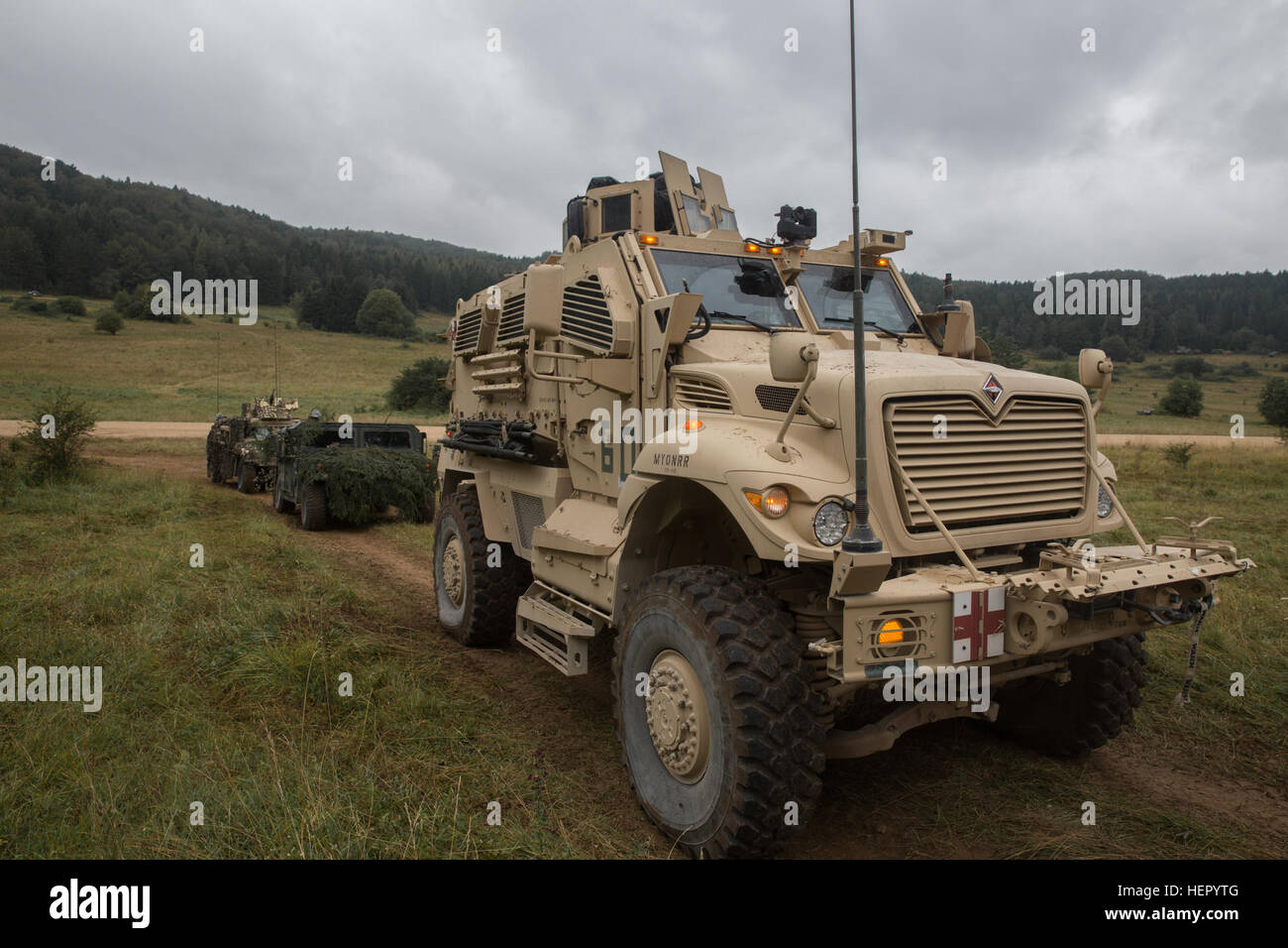 A U.S. Army MaxxPro, Mine-Resistant, Ambush Protected vehicle of Brigade Engineer Battalion waits in line at a refill point while conducting preperations during exercise Combined Resolve VII at the U.S. Army’s Joint Multinational Readiness Center in Hohenfels Germany, Sept. 5, 2016. Combined Resolve VII is a 7th Army Training Command, U.S. Army Europe-directed exercise, taking place at the Grafenwoehr and Hohenfels Training Areas, Aug. 8 to Sept. 15, 2016. The exercise is designed to train the Army’s regionally allocated forces to the U.S. European Command. Combined Resolve VII includes more t Stock Photo