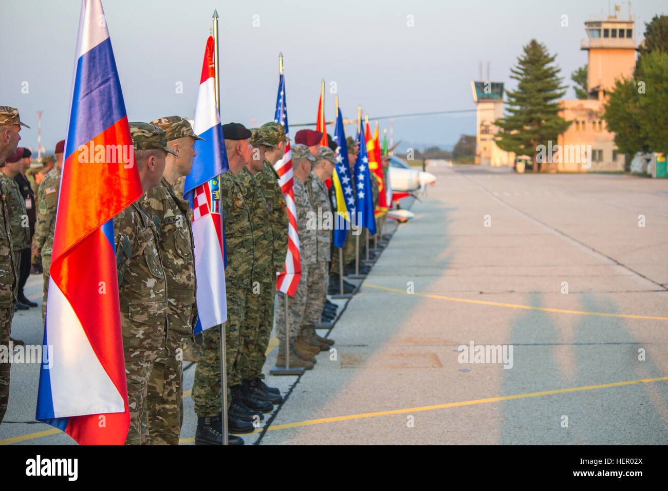 Soldiers from 10 ally and partner nations in formation during the opening ceremony of exercise Immediate Response 16. Immediate Response 16 is a multinational, brigade-level command post exercise utilizing computer-assisted simulations and field training exercises spanning two countries, Croatia and Slovenia. The exercises and simulations are built upon a decisive action based scenario and are designed to enhance regional stability, strengthen Allied and partner nation capacity, and improve interoperability among partner nations. The exercise will occur Sept. 9-23, 2016, and will include more  Stock Photo