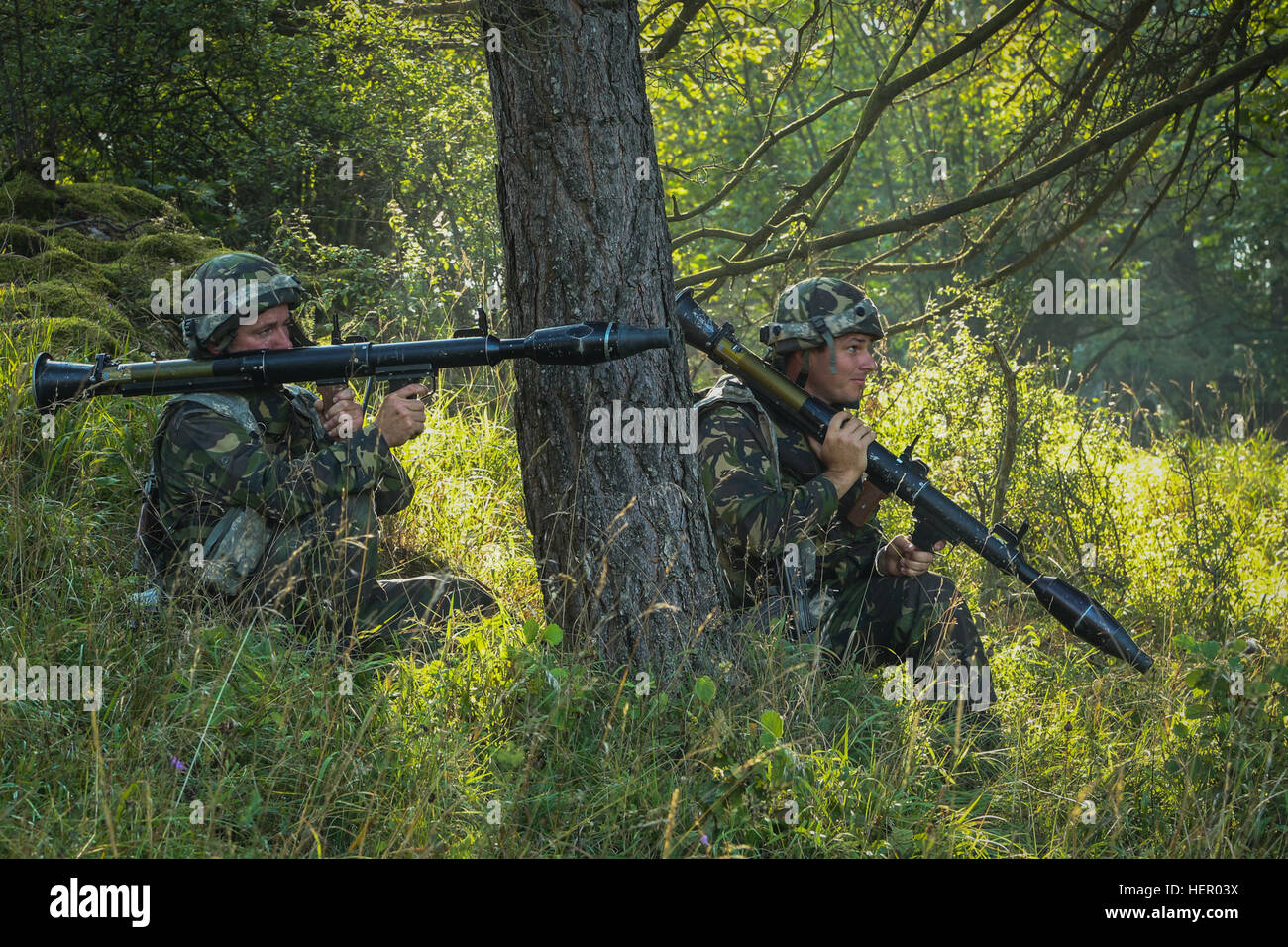 Romanian soldiers of the 33rd Mountain Battalion Posada fire simulated rocket propelled grenade launchers while conducting a simulated attack during exercise Combined Resolve VII at the U.S. Army’s Joint Multinational Readiness Center in Hohenfels Germany, Sept. 11, 2016. Combined Resolve VII is a 7th Army Training Command, U.S. Army Europe-directed exercise, taking place at the Grafenwoehr and Hohenfels Training Areas, Aug. 8 to Sept. 15, 2016. The exercise is designed to train the Army’s regionally allocated forces to the U.S. European Command. Combined Resolve VII includes more than 3,500 p Stock Photo