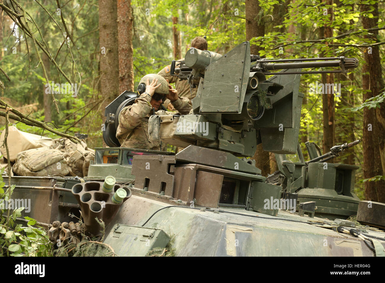 A U.S. Soldier of Rider Company, 2nd Battalion, 7th Infantry Regiment, 1st Armored Brigade prepares to enter a vehicle while conducting a simulated defensive operation during exercise Combined Resolve VII at the U.S. Army’s Joint Multinational Readiness Center in Hohenfels Germany, Sept. 11, 2016. Combined Resolve VII is a 7th Army Training Command, U.S. Army Europe-directed exercise, taking place at the Grafenwoehr and Hohenfels Training Areas, Aug. 8 to Sept. 15, 2016. The exercise is designed to train the Army’s regionally allocated forces to the U.S. European Command. Combined Resolve VII  Stock Photo