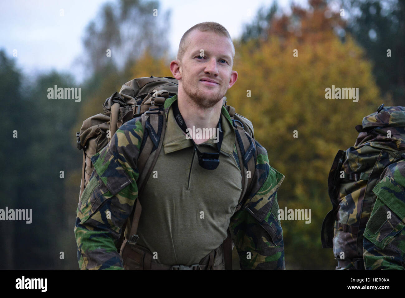 A Dutch soldier completes a 12-mile ruck march during the European Best ...