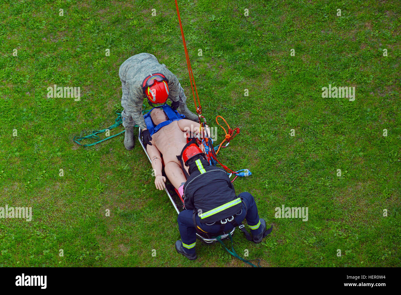 U.S. Army and Air Force personnel conduct a simulated casualty rescue ...
