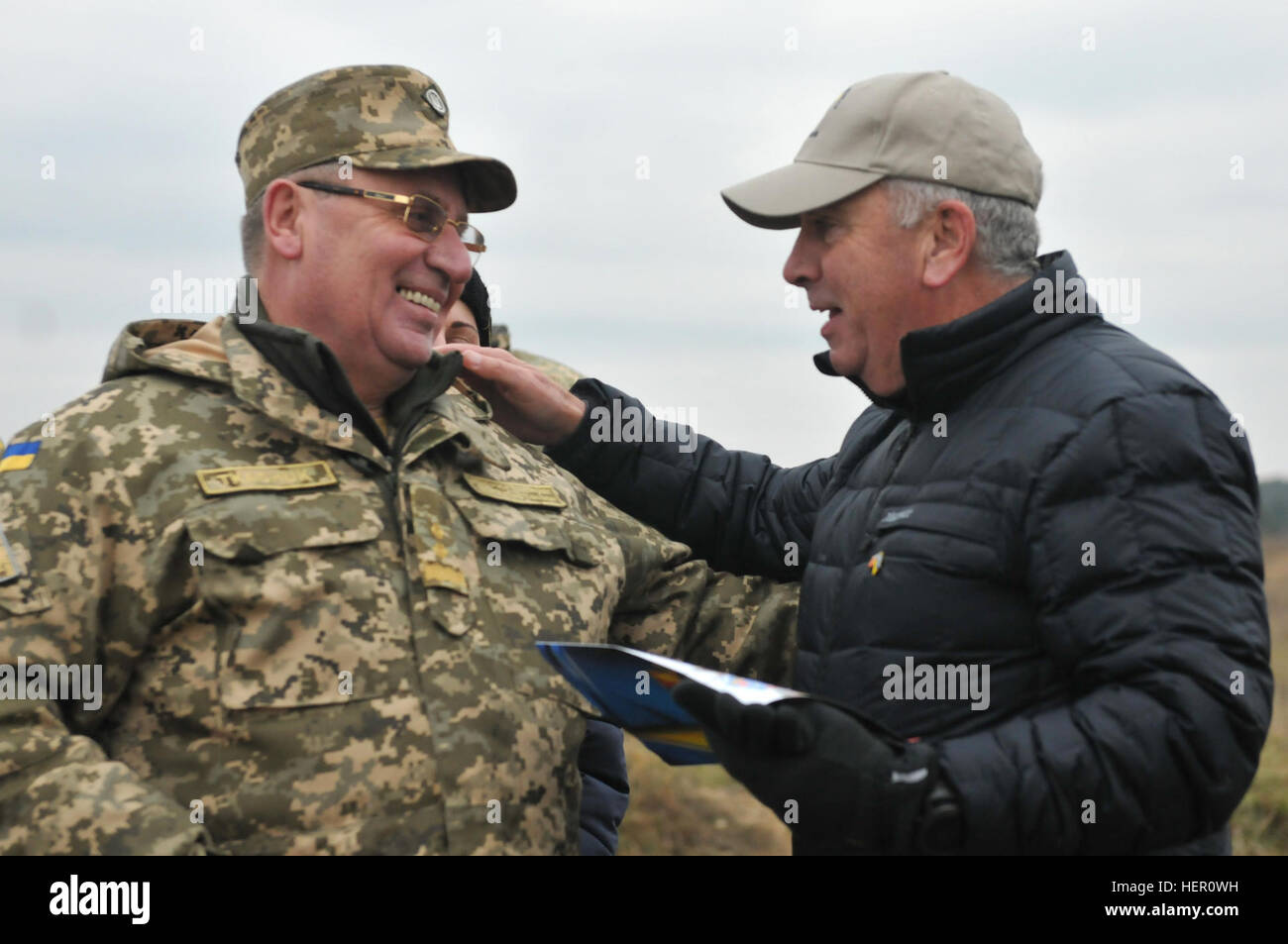 YAVORIV, Ukraine--Army retired General John Abizaid, advisor to Ukraine's Defense Minister speaks with Lt. Gen. Pavlo Tkachuk, commander of Ukraine's Land Forces Academy during a tour of the ranges at the International Peacekeeping and Security Center, Nov.11. Abizaid was recently appointed advisor to Ukrainian Defense Minister Stepan Poltorak by Secretary of Defense Ash Carter. JMTG-U’s mission is part of ongoing efforts to contribute to Ukraine's long-term military reform and professionalism and to help improve the country's internal defense capabilities and training capacity. (Army photo by Stock Photo